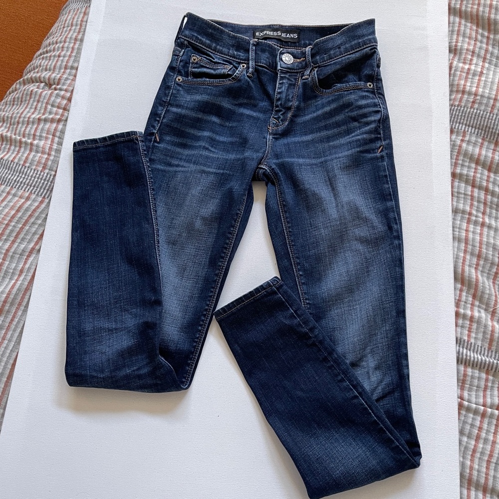 Express stretchy mid rise dark wash jeans size 00 straight leg
